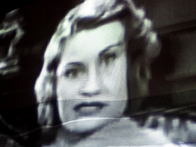 Distorted woman on screen